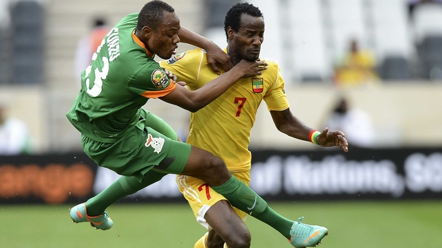Zambia's Stoppila Sunzu gets to grips with Ethiopia's Said Ahmed