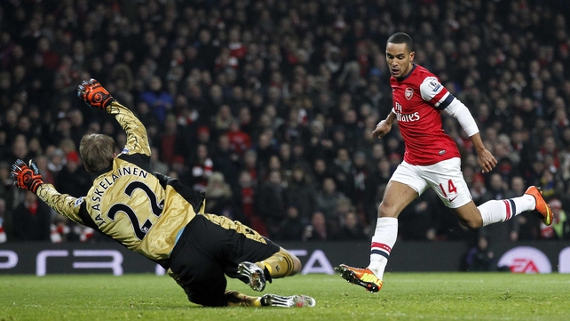 Theo Walcott slots home Arsenal's fourth