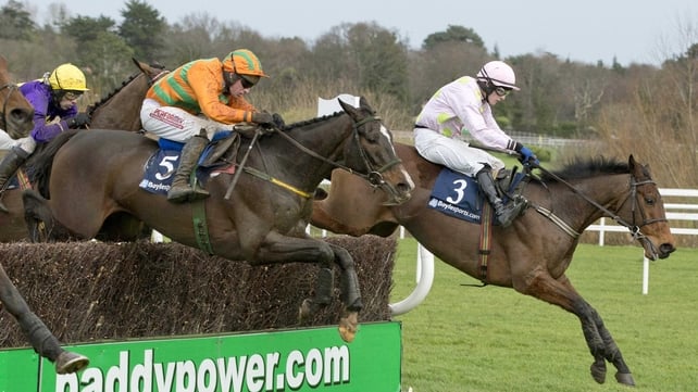 Texas Jack (orange and green) is brought with a well-timed challenge by Paul Carberry