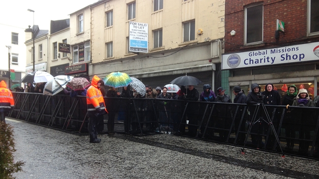 Locals braved the weather to welcome Neeson home