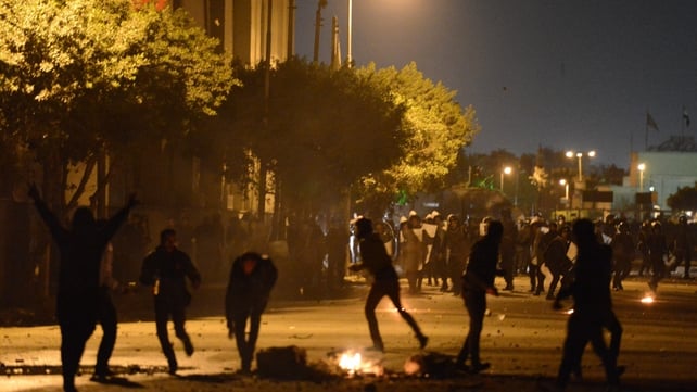 Egyptian protesters clash with riot police near Cairo's Tahrir Square Egyptian protesters clash with riot police near Cairo's Tahrir Square
