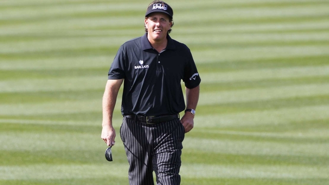 Two-time champion Mickelson struck 11 birdies for an 11-under 60