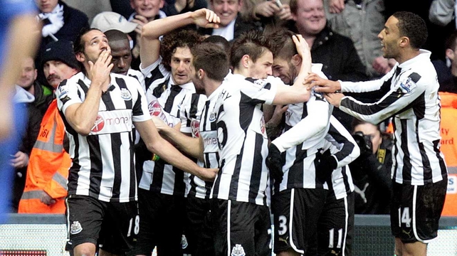 Newcastle United celebrate Jonas Gutierrez's opening goal at St James' Park