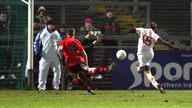 Mark Donnelly of Tyrone scores a goal