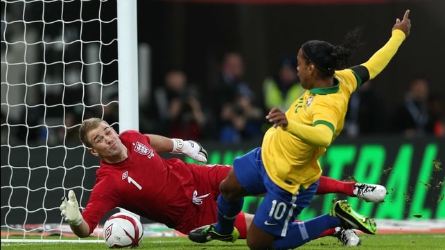Joe Hart reacted quickly to deny Ronaldinho's follow up to his missed penalty