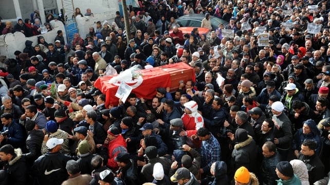 Chokri Belaid's coffin is carried through the streets of Jebel al-Jaloud Chokri Belaid's coffin is carried through the streets of Jebel al-Jaloud