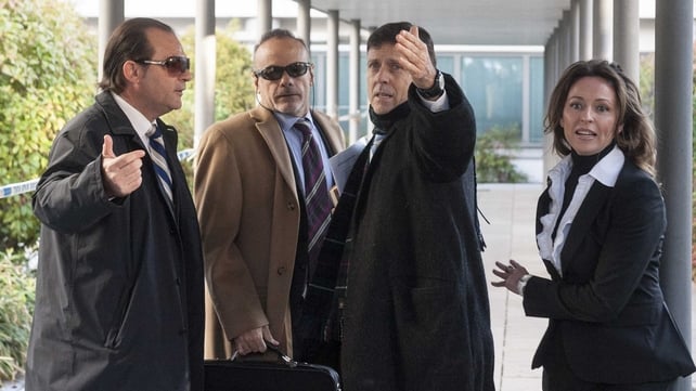 Doctor Eufemiano Fuentes (second from right) arrives at a court house in Madrid on 28 January 2013