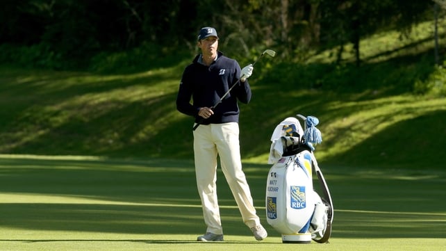 Matt Kuchar prepares to hit his second shot on the 12th hole