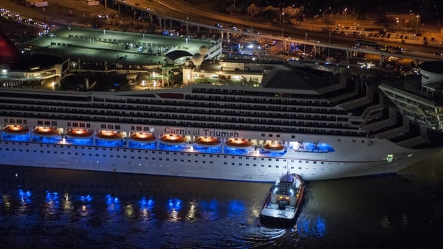 It took several hours to get passengers off the Triumph ship when it finally docked in Mobile It took several hours to get passengers off the Triumph ship when it finally docked in Mobile