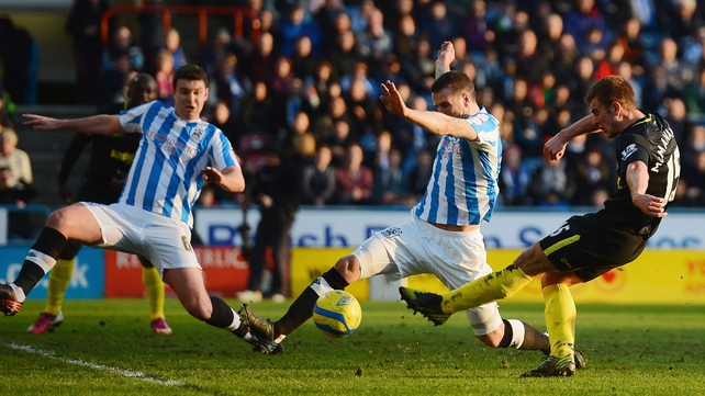 Callum McManaman opens the scoring for Wigan