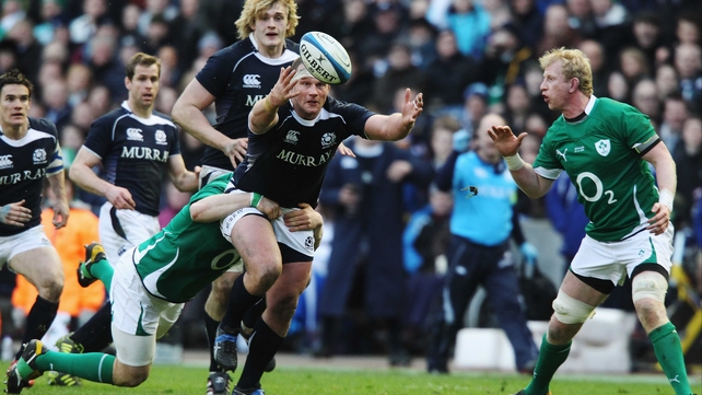 Geoff Cross is tackled during the 2011 meeting with Ireland