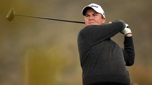 Lowry knocks out top seed