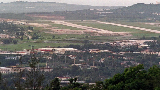 The US government is to air-drop dead mice laced with painkillers down on Guam's jungle canopy The US government is to air-drop dead mice laced with painkillers down on Guam's jungle canopy