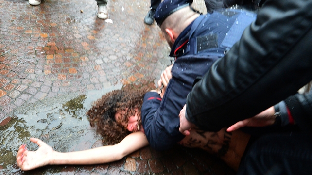 Police tackled the women and took them away Police tackled the women and took them away