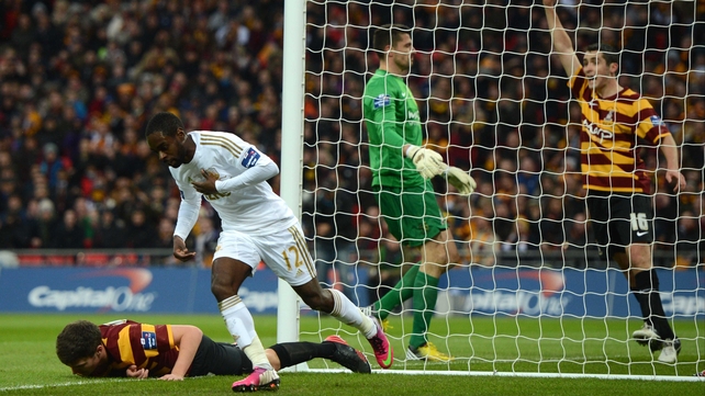 Nathan Dyer wheels away in delight after opening the scoring for Swansea in the Capital One Cup final