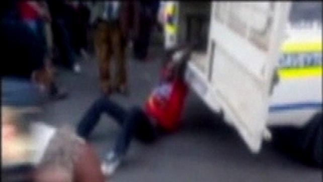 Mido Macia was tied to a police vehicle and dragged through a street Mido Macia was tied to a police vehicle and dragged through a street