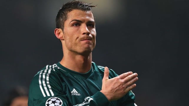 Cristiano Ronaldo salutes supporters at Old Trafford