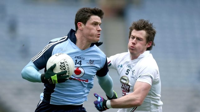 Diarmuid Connolly of Dublin holds off Kildare's Emmet Bolton