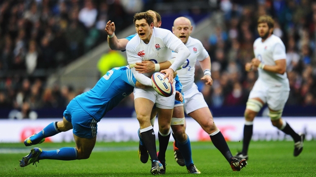 Andrea Masi tackles Alex Goode