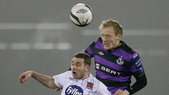 Shamrock Rovers' Derek Foran (right) makes the team of the week in defence, while Dundalk's Kurtis Byrne (left) gets the nod in midfield