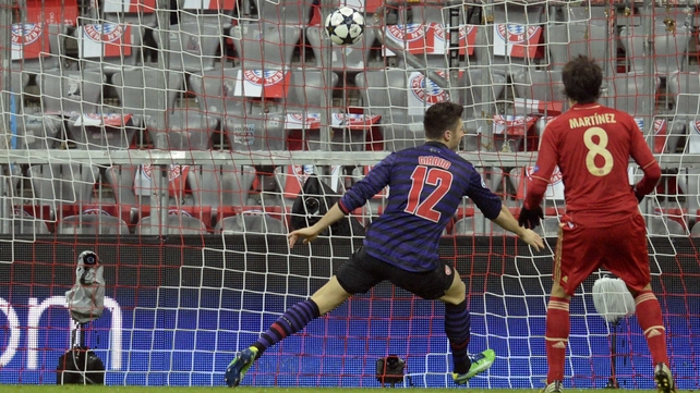 Oliver Giroud and Laurent Koscielny gave Arsenal victory but it wasn't enough to reach the quarter-finals