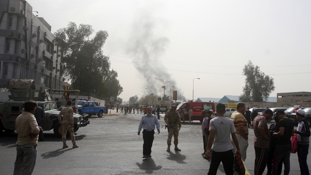 Smoke billows from the scene of a car bomb attack in Baghdad earlier today Smoke billows from the scene of a car bomb attack in Baghdad earlier today