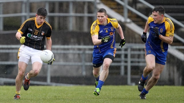 Roscommon's Sean McDermott and Neil Collins track Niall Delargy of Antrim