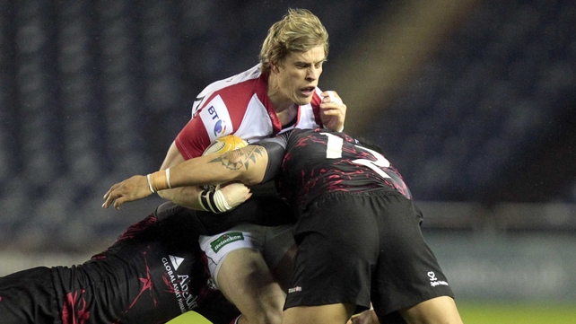 Edinburgh's Sean Cox and Ben Atiga tackle Ulster's Andrew Trimble