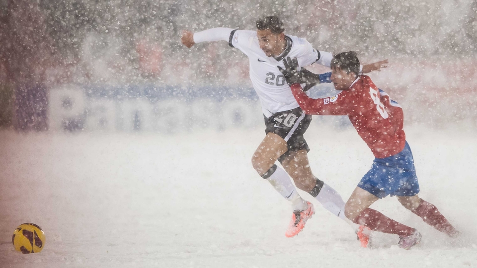Costa Rica's Bryan Oviedo lunges at US star Geoff Cameron