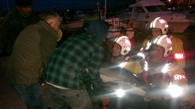 The dolphin was wrapped up and transported by jeep to the harbour The dolphin was wrapped up and transported by jeep to the harbour