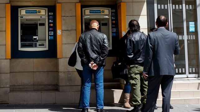 Cyprus's economy was hit hard by the restructuring of its once oversized banking sector Cyprus's economy was hit hard by the restructuring of its once oversized banking sector