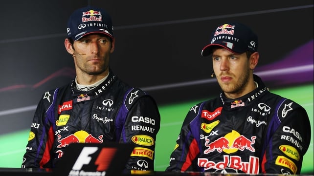 If looks could kill - Mark Webber (L) and Sebastian Vettel at the post-race press conference