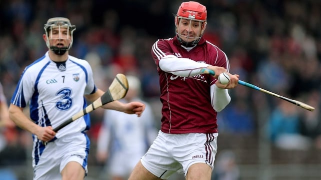 Iarla Tannian of Galway gets away from Waterford's Darragh Fives