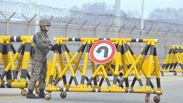 A South Korean soldier sets up a barricade in the demilitarised zone on the border A South Korean soldier sets up a barricade in the demilitarised zone on the border