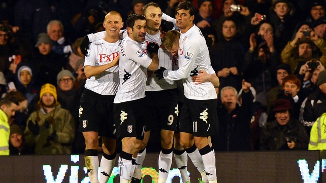 Dimitar Berbatov celebrates scoring Fulham's opener with his team-mates at Craven Cottage