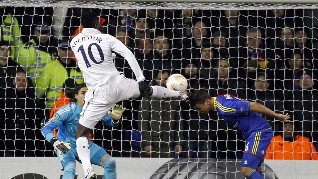Emmanuel Adebayor fires home the first goal for Tottenham
