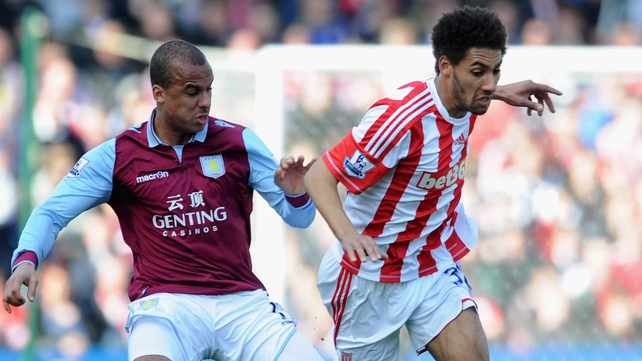 Ryan Shotton of Stoke City competes with Gabriel Agbonlahor of Aston Villa
