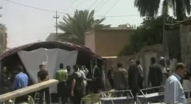 A suicide bomber killed 22 people and wounded 60 in a crowded election campaign tent A suicide bomber killed 22 people and wounded 60 in a crowded election campaign tent