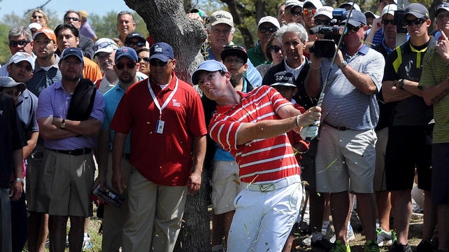 Rory McIlroy shot a 71 to finish four off the lead of Billy Horschel
