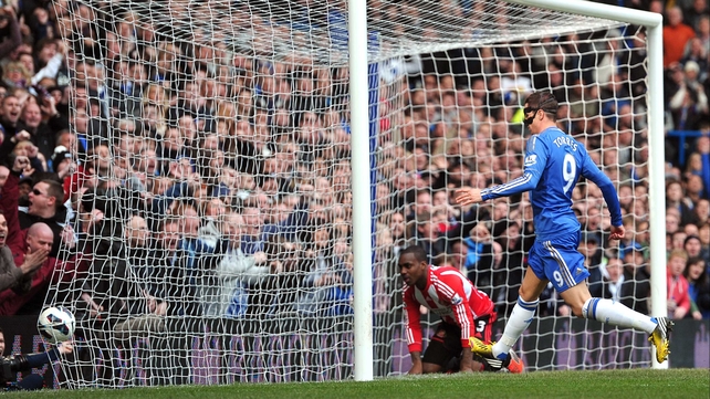 Torres runs to collect the ball after Matthew Kilgallon's own goal