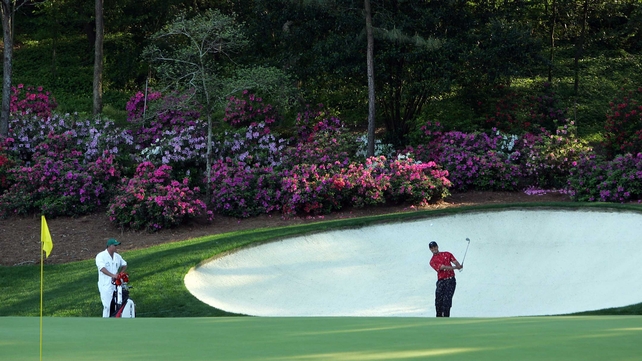 Tiger Woods hits his third shot on the 13th hole during the final round of the 2005 Masters