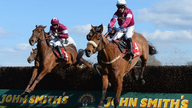 First Lieutenant (l) and Quito De La Roque jumping the last in the Betfred Bowl at Aintree