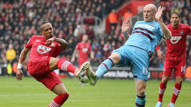 James Collins of West Ham challenges Nathaniel Clyne of Southampton