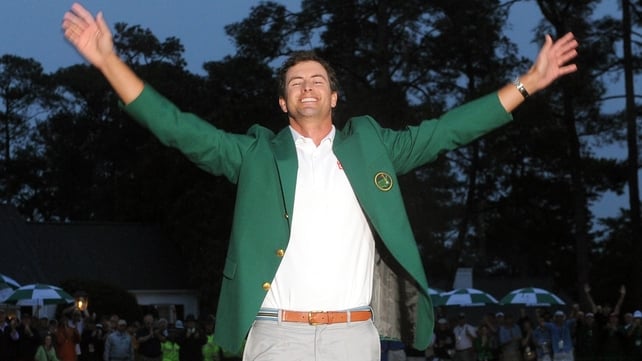 Adam Scott was presented with his Green Jacket from last year's champion Bubba Watson