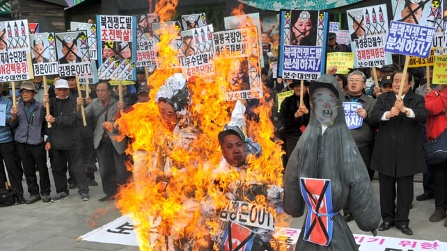 South Koreans burned effigies during a protest in Seoul yesterday South Koreans burned effigies during a protest in Seoul yesterday