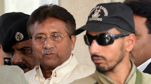 Former Pakistani president Pervez Musharraf is escorted by paramilitary soldiers as he leaves the Pindi High Court Former Pakistani president Pervez Musharraf is escorted by paramilitary soldiers as he leaves the Pindi High Court