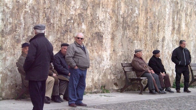 Men gathered in Alghero