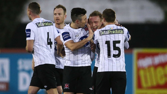 Dundalk players celebrate with opening goalscorer John Mountney