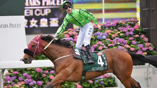 Jockey Tommy Berry celebrates aboard winner Military Attack