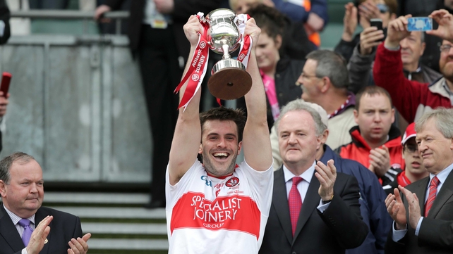 Derry's Mark Lynch lifts the Division 2 trophy